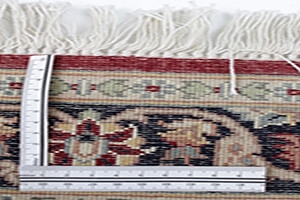 Jak rozpoznać że dywan jest wiązany ręcznie?